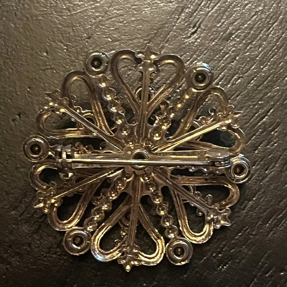 Vintage Gold Tone Starburst Brooch with Amber Topaz and Clear Rhinestones